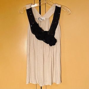 Imaginary Voyage cream tank top w/ black sequin & flower embellishment. Size M.